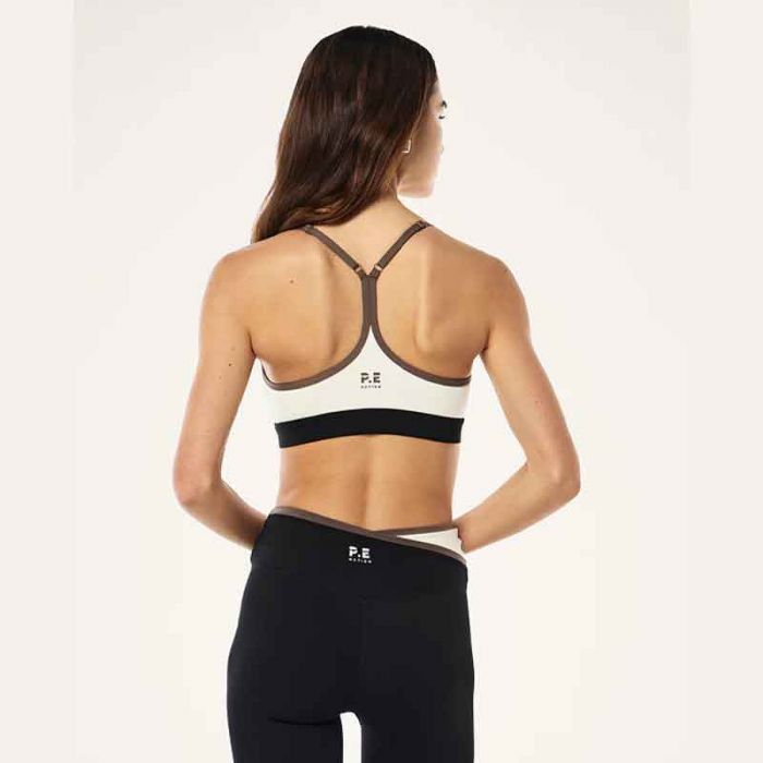 SIGNATURE SPORTS BRA - حمالة صدر رياضية | P.E NATION - بي إي نايشن SIGNATURE SPORTS BRA - حمالة صدر رياضية | P.E NATION - بي إي نايشن