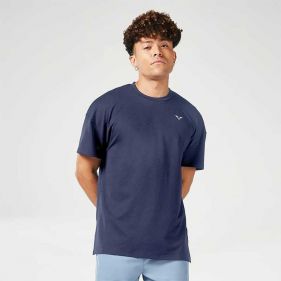 ESSENTIAL OVERSIZED TEE - ملابس رياضية