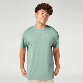 ESSENTIAL OVERSIZED TEE - ملابس رياضية