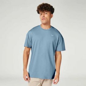 ESSENTIAL OVERSIZED TEE - ملابس رياضية