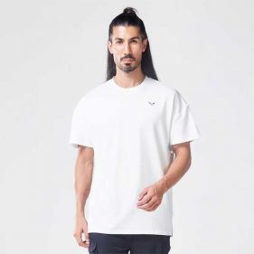 ESSENTIAL OVERSIZED TEE - ملابس رياضية
