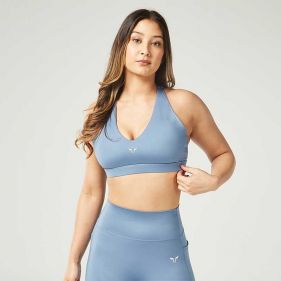 ESSENTIAL ADJUSTABLE MID IMPACT BRA - حمالة صدر رياضية